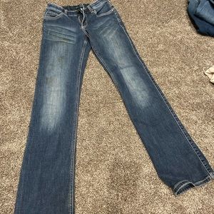 Q-baby riding wranglers women’s jeans